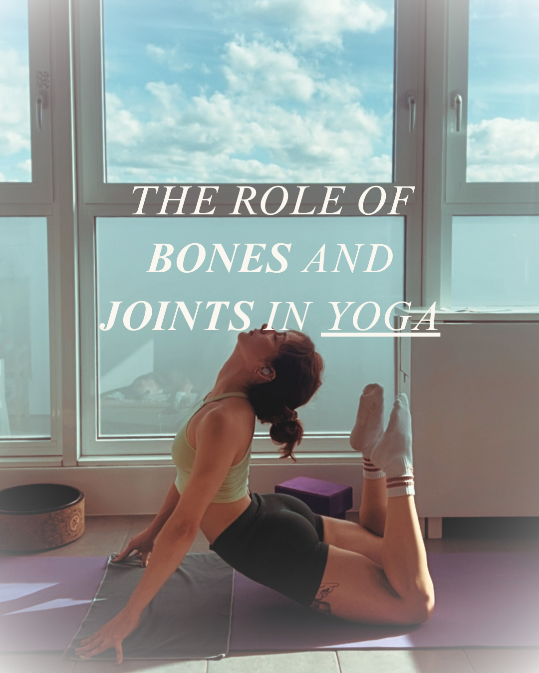 A woman doing king cobra pose on yoga mat.