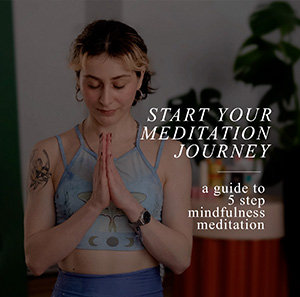 A woman meditation with her hands in prayer position